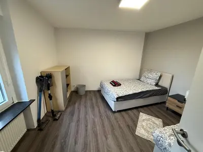 Ein Bett oder Betten in einem Zimmer der Unterkunft Monteur und Ferienhaus Herne Zentrum WLAN, Küche und Parkplatz