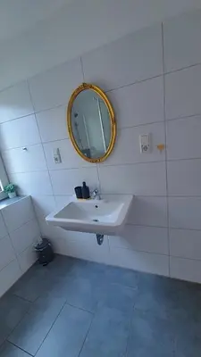Ein Badezimmer in der Unterkunft Zentrale Wohnung mit Wohnküche für bis 6 Gäste