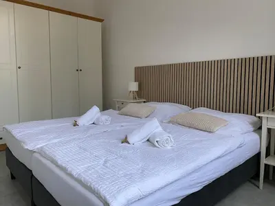 Ein Bett oder Betten in einem Zimmer der Unterkunft Ferienwohnung in Solingen Innenstadt