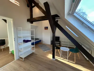 Ein Bett oder Betten in einem Zimmer der Unterkunft Ferienhaus im Duisburger Norden - bis zu 8 Personen - Arbeiten im Ruhrgebiet