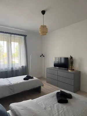 Ein Bett oder Betten in einem Zimmer der Unterkunft Socha Apartments- Monteurwohnung in Mettmann