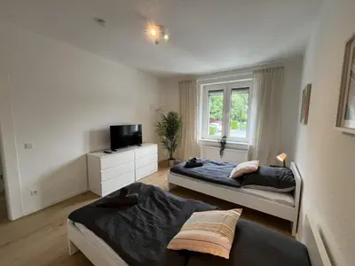 Ein Bett oder Betten in einem Zimmer der Unterkunft Socha Apartments- Monteurwohnung in Mettmann