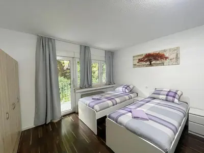 Ein Bett oder Betten in einem Zimmer der Unterkunft Voll ausgestattetes Apartment in Essen