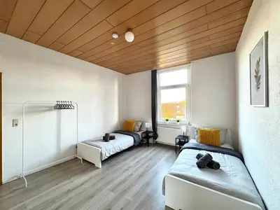 Ein Bett oder Betten in einem Zimmer der Unterkunft SAP10- Fitter's apartment Wuppertal