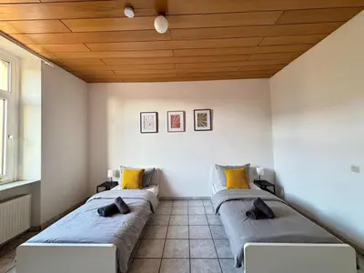 Ein Bett oder Betten in einem Zimmer der Unterkunft SAP10- Fitter's apartment Wuppertal