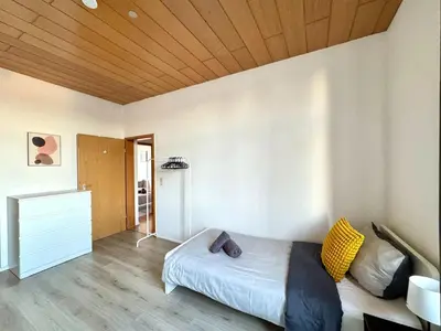 Ein Bett oder Betten in einem Zimmer der Unterkunft SAP10- Fitter's apartment Wuppertal