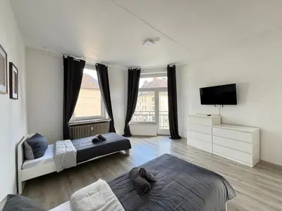 Ein Bett oder Betten in einem Zimmer der Unterkunft SAP09 Fitter's apartment Wuppertal