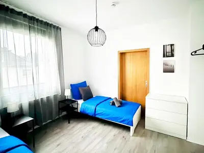 Ein Bett oder Betten in einem Zimmer der Unterkunft SAP08- Fitter's apartment in Solingen