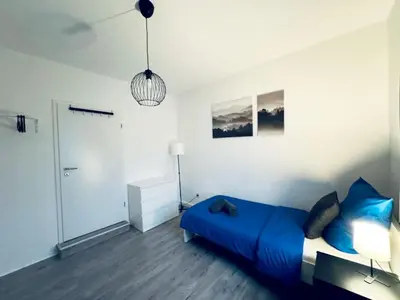 Ein Bett oder Betten in einem Zimmer der Unterkunft SAP08- Fitter's apartment in Solingen