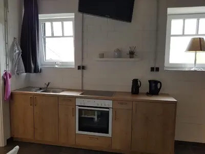 Küche/Küchenzeile in der Unterkunft Alte Werkstatt - Monteurwohnung auf dem Land