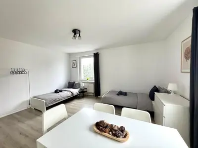Ein Bett oder Betten in einem Zimmer der Unterkunft SAP07- Fitter's apartment in Ennepetal