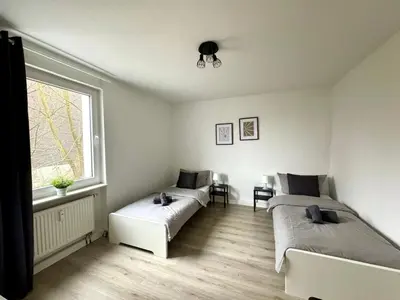 Ein Bett oder Betten in einem Zimmer der Unterkunft SAP07- Fitter's apartment in Ennepetal