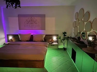 Ein Bett oder Betten in einem Zimmer der Unterkunft Wellnesshaus - Whirlpool - Sauna - Relax