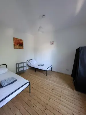 Ein Bett oder Betten in einem Zimmer der Unterkunft Wohnung Nähe Rhein