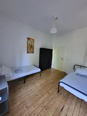 Ein Bett oder Betten in einem Zimmer der Unterkunft Wohnung Nähe Rhein