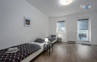 Ein Bett oder Betten in einem Zimmer der Unterkunft BEGE APARTMENTS ComfortStay