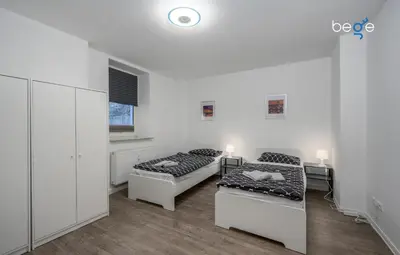 Ein Bett oder Betten in einem Zimmer der Unterkunft BEGE APARTMENTS ComfortStay