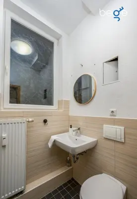 Ein Badezimmer in der Unterkunft BEGE APARTMENTS ComfortStay