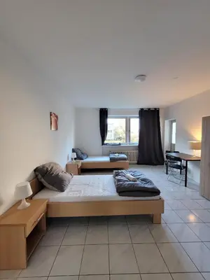 Ein Bett oder Betten in einem Zimmer der Unterkunft 5-Betten Unterkunft in Werne