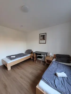 Ein Bett oder Betten in einem Zimmer der Unterkunft 5-Betten Unterkunft in Werne