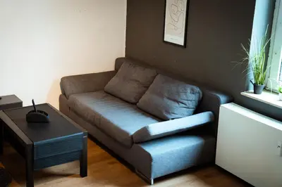 Ein Sitzbereich in der Unterkunft Wohnung am See