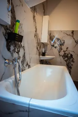 Ein Badezimmer in der Unterkunft Wohnung am See