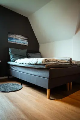 Ein Bett oder Betten in einem Zimmer der Unterkunft Wohnung am See
