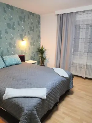 Ein Bett oder Betten in einem Zimmer der Unterkunft Ferienwohnung Laura am Bahnhof Schwerte Central