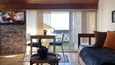 Ein Sitzbereich in der Unterkunft LOEH38 Apartment Schalksmühle
