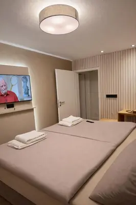 Ein Bett oder Betten in einem Zimmer der Unterkunft LMB stays