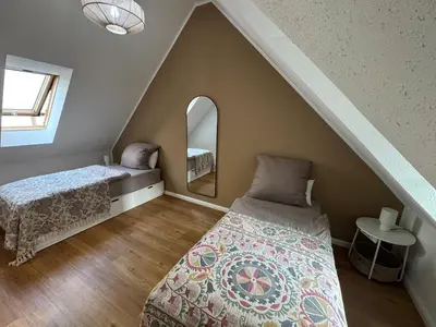 Ein Bett oder Betten in einem Zimmer der Unterkunft LMB stays