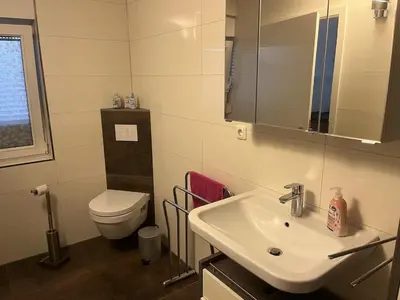Ein Badezimmer in der Unterkunft Am Stadtwald Bissingheim