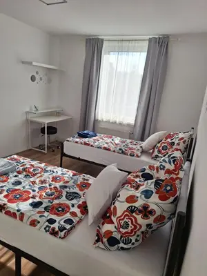 Ein Bett oder Betten in einem Zimmer der Unterkunft Modernes 3-Zimmer-Apartment mit Top-Anbindung in Wuppertal