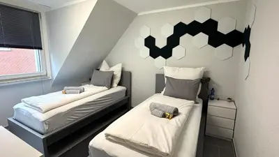 Ein Bett oder Betten in einem Zimmer der Unterkunft DUTTI'S HOME - Apartment B I 2 Rooms I 4 Beds I Kitchen I WiFi I TV I Parking I Autobahn