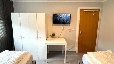 Ein Bett oder Betten in einem Zimmer der Unterkunft DUTTI'S HOME - Apartment B I 2 Rooms I 4 Beds I Kitchen I WiFi I TV I Parking I Autobahn