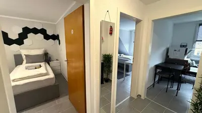 Ein Bett oder Betten in einem Zimmer der Unterkunft DUTTI'S HOME - Apartment B I 2 Rooms I 4 Beds I Kitchen I WiFi I TV I Parking I Autobahn