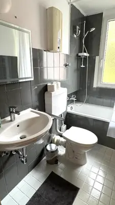 Ein Badezimmer in der Unterkunft DUTTI'S HOME - Apartment B I 2 Rooms I 4 Beds I Kitchen I WiFi I TV I Parking I Autobahn