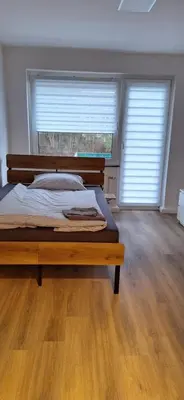 Ein Bett oder Betten in einem Zimmer der Unterkunft Mariia