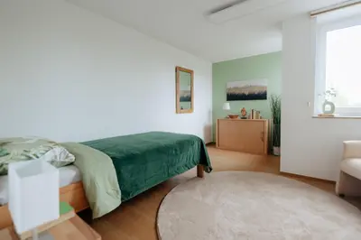 Ein Bett oder Betten in einem Zimmer der Unterkunft Komfortquartier Schwerte