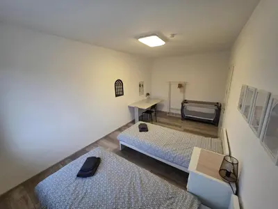Ein Bett oder Betten in einem Zimmer der Unterkunft Doppelzimmer für bis zu 4 Personen - 4 OG