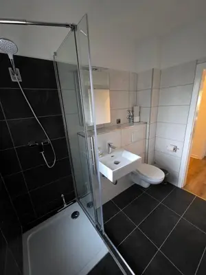 Ein Badezimmer in der Unterkunft Doppelzimmer für bis zu 4 Personen - 3 OG