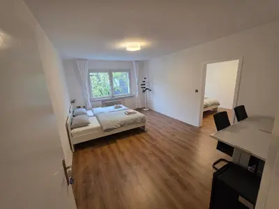Ein Bett oder Betten in einem Zimmer der Unterkunft Doppelzimmer für bis zu 4 Personen - 3 OG