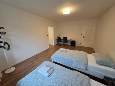 Ein Bett oder Betten in einem Zimmer der Unterkunft Doppelzimmer für bis zu 4 Personen - 3 OG