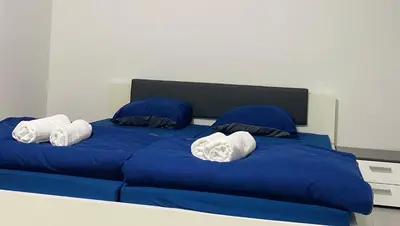 Ein Bett oder Betten in einem Zimmer der Unterkunft 4-Personen City Apartment Essen