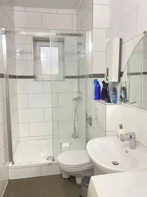 Ein Badezimmer in der Unterkunft 4-Personen City Apartment Essen