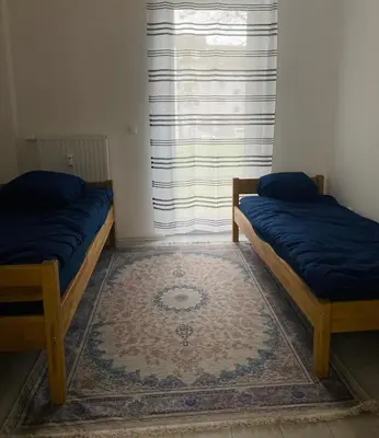 Ein Bett oder Betten in einem Zimmer der Unterkunft 4-Personen City Apartment Essen
