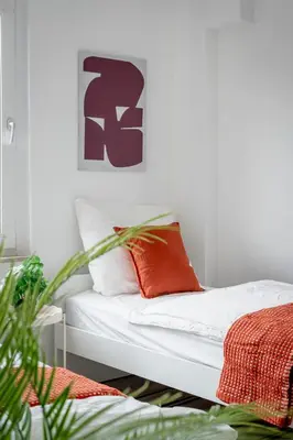 Ein Bett oder Betten in einem Zimmer der Unterkunft SpaceStays Apartment 4 Personen WLAN Smart-TV
