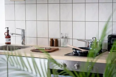 Küche/Küchenzeile in der Unterkunft SpaceStays Apartment 4 Personen WLAN Smart-TV