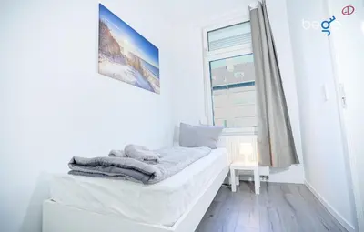 Ein Bett oder Betten in einem Zimmer der Unterkunft BEGE APARTMENTS WorkSpot