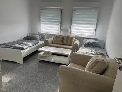 Ein Sitzbereich in der Unterkunft Modernes City Apartment 2 Min zum HBF Mülheim